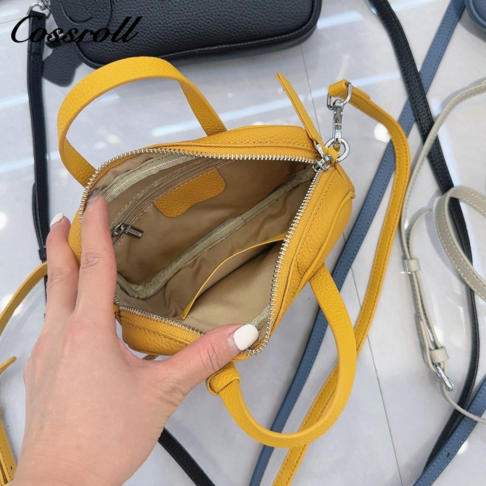 Head layer cowhide shoulder women's bag crossbody women's bag Europe and the United States fashion hundred practical soft leather round barrel apple bag leather