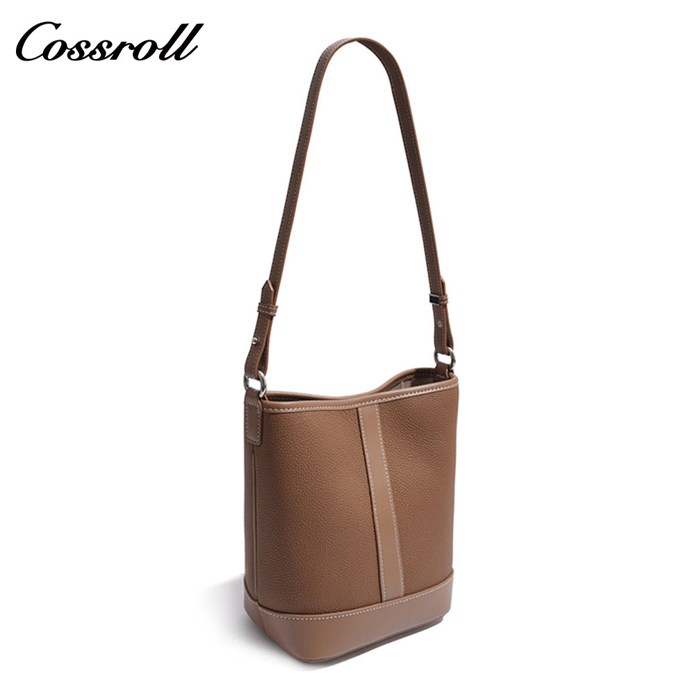 Simple fashion color collision commuter 2025 new togo head layer cowhide bucket bag shoulder bag