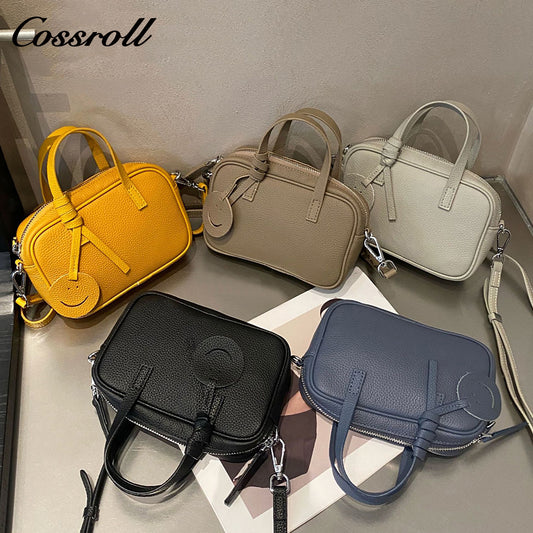 Head layer cowhide shoulder women's bag crossbody women's bag Europe and the United States fashion hundred practical soft leather round barrel apple bag leather