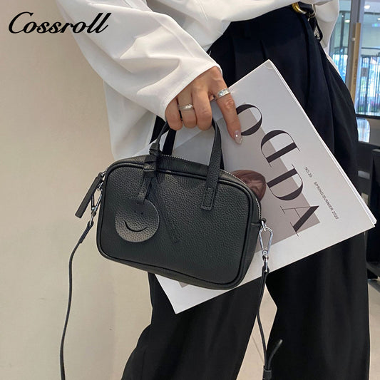 Head layer cowhide shoulder women's bag crossbody women's bag Europe and the United States fashion hundred practical soft leather round barrel apple bag leather