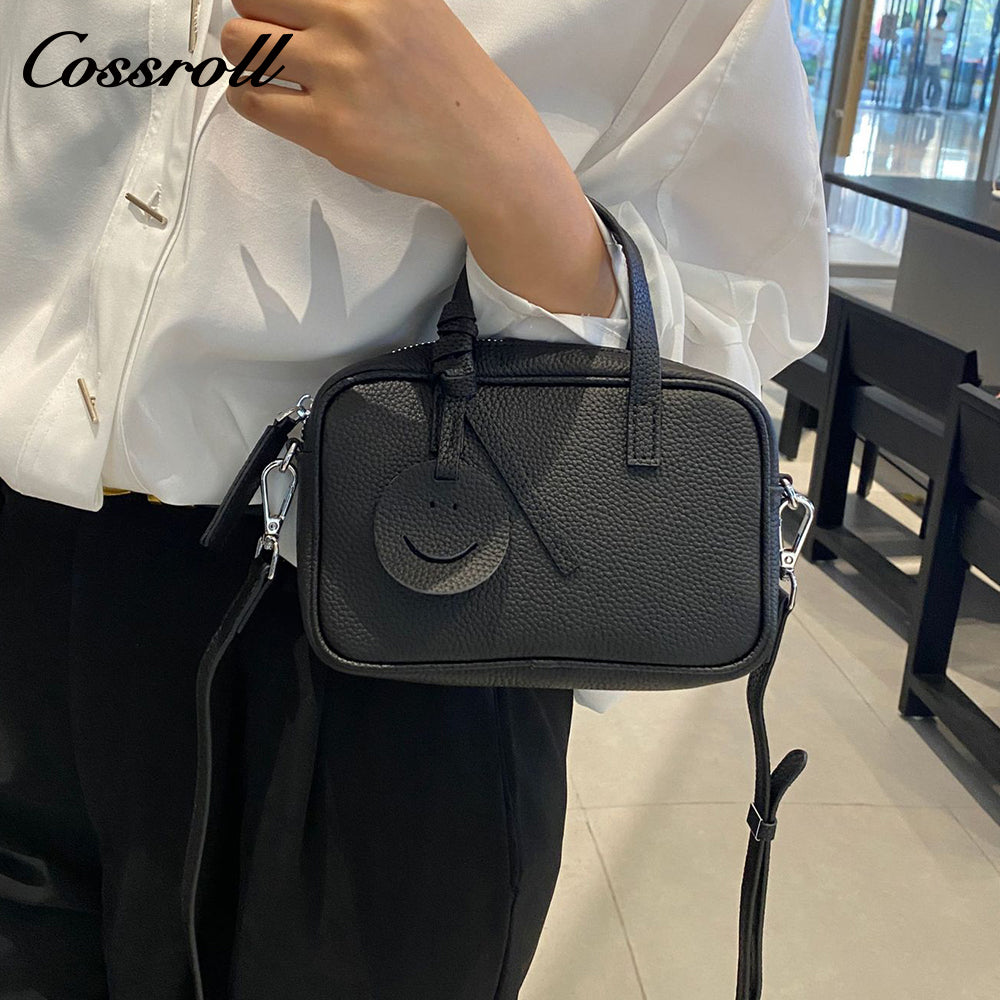 Head layer cowhide shoulder women's bag crossbody women's bag Europe and the United States fashion hundred practical soft leather round barrel apple bag leather