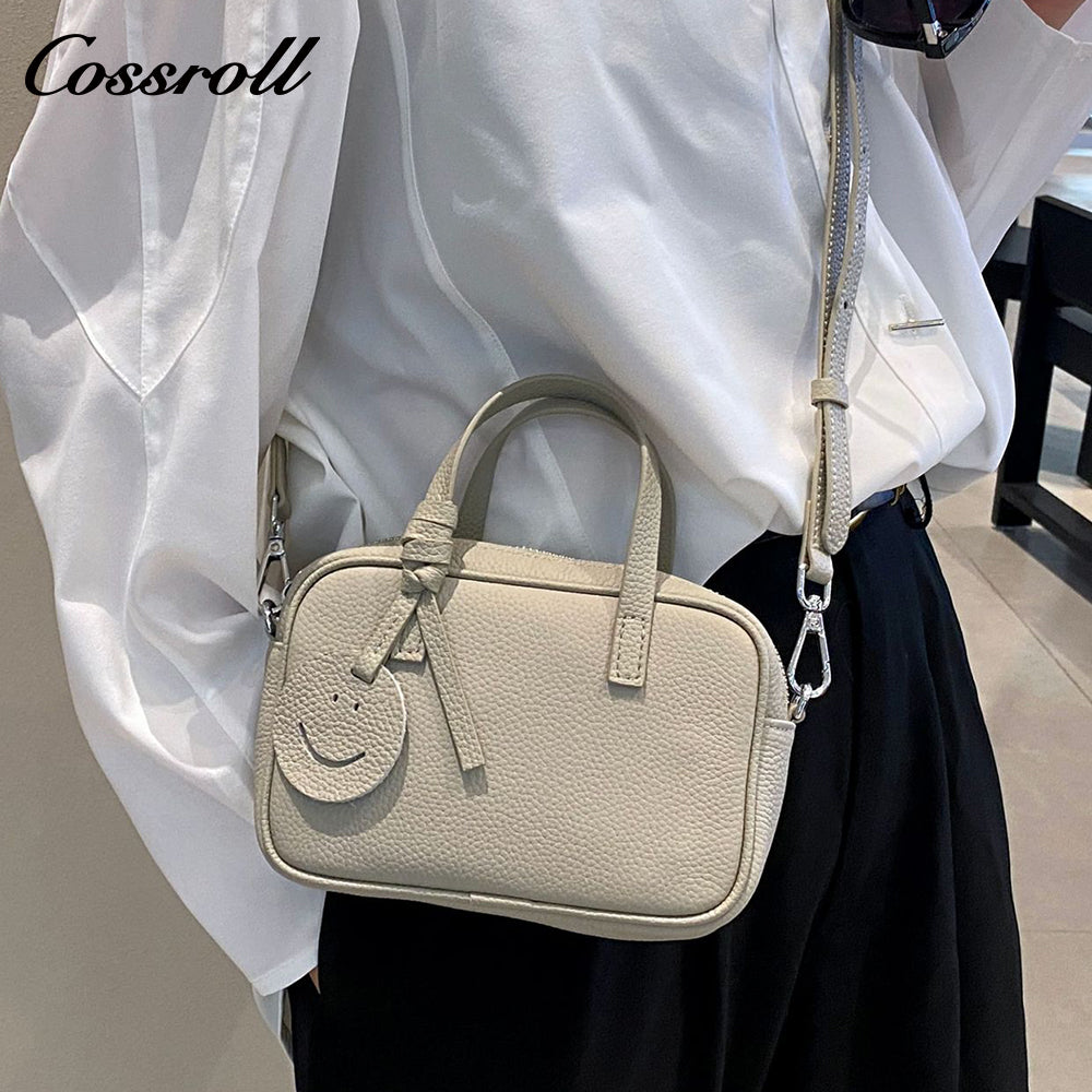 Head layer cowhide shoulder women's bag crossbody women's bag Europe and the United States fashion hundred practical soft leather round barrel apple bag leather