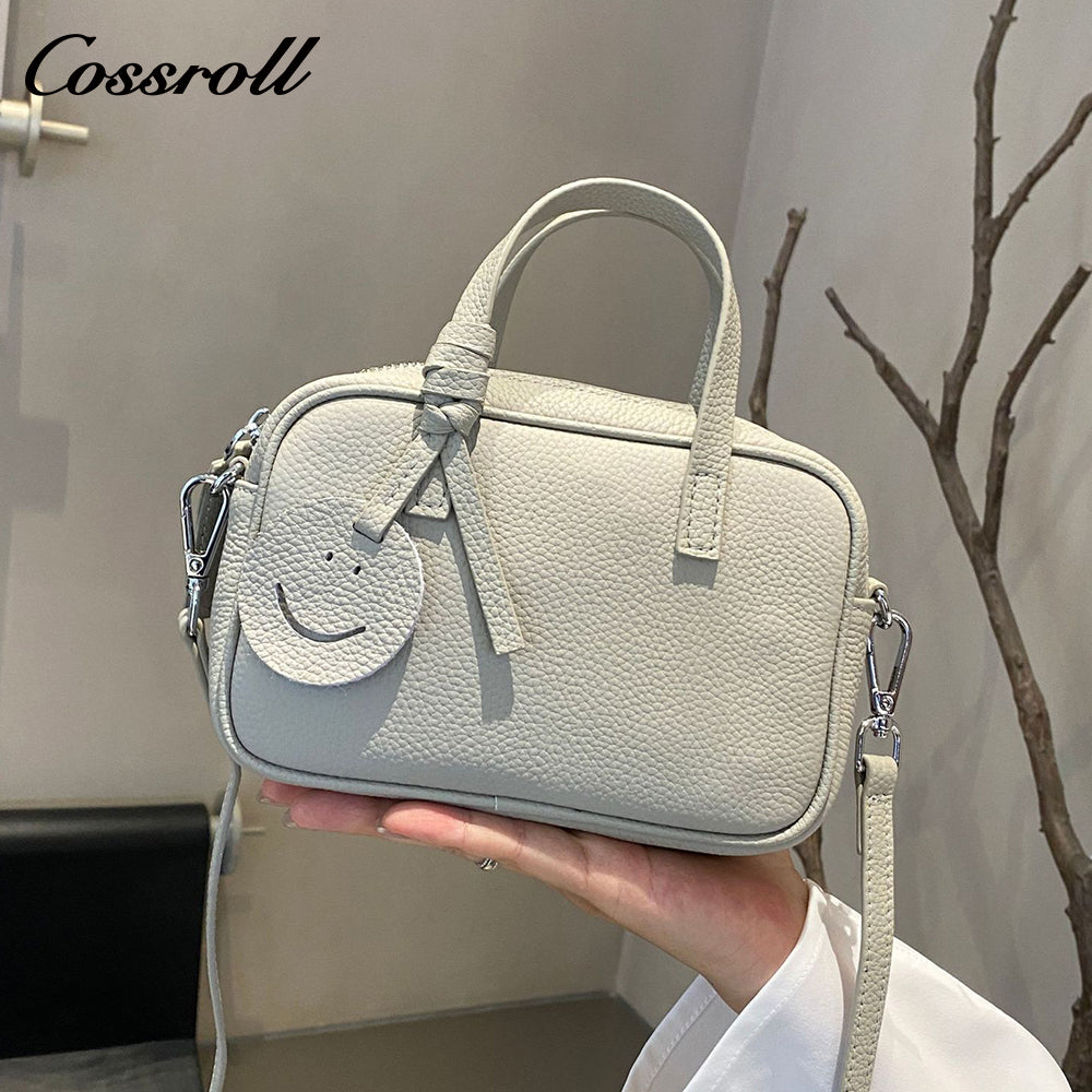 Head layer cowhide shoulder women's bag crossbody women's bag Europe and the United States fashion hundred practical soft leather round barrel apple bag leather
