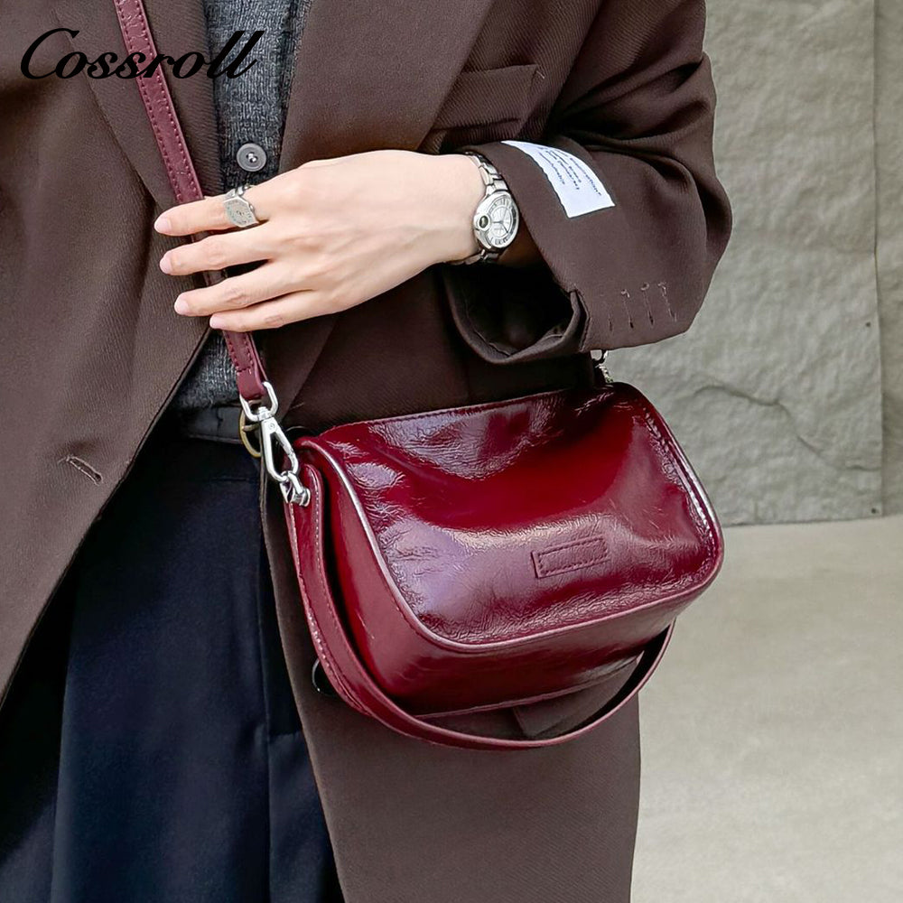 Oil wax cowhide bag female new fashion hundred with shoulder bag senior sense of niche retro commuting crossbody bag