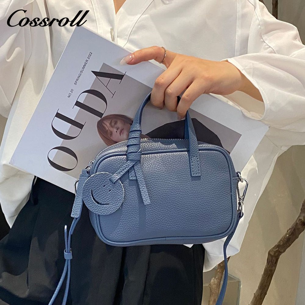 Head layer cowhide shoulder women's bag crossbody women's bag Europe and the United States fashion hundred practical soft leather round barrel apple bag leather