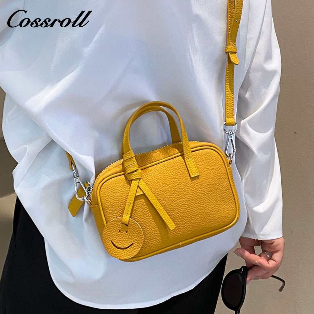 Head layer cowhide shoulder women's bag crossbody women's bag Europe and the United States fashion hundred practical soft leather round barrel apple bag leather