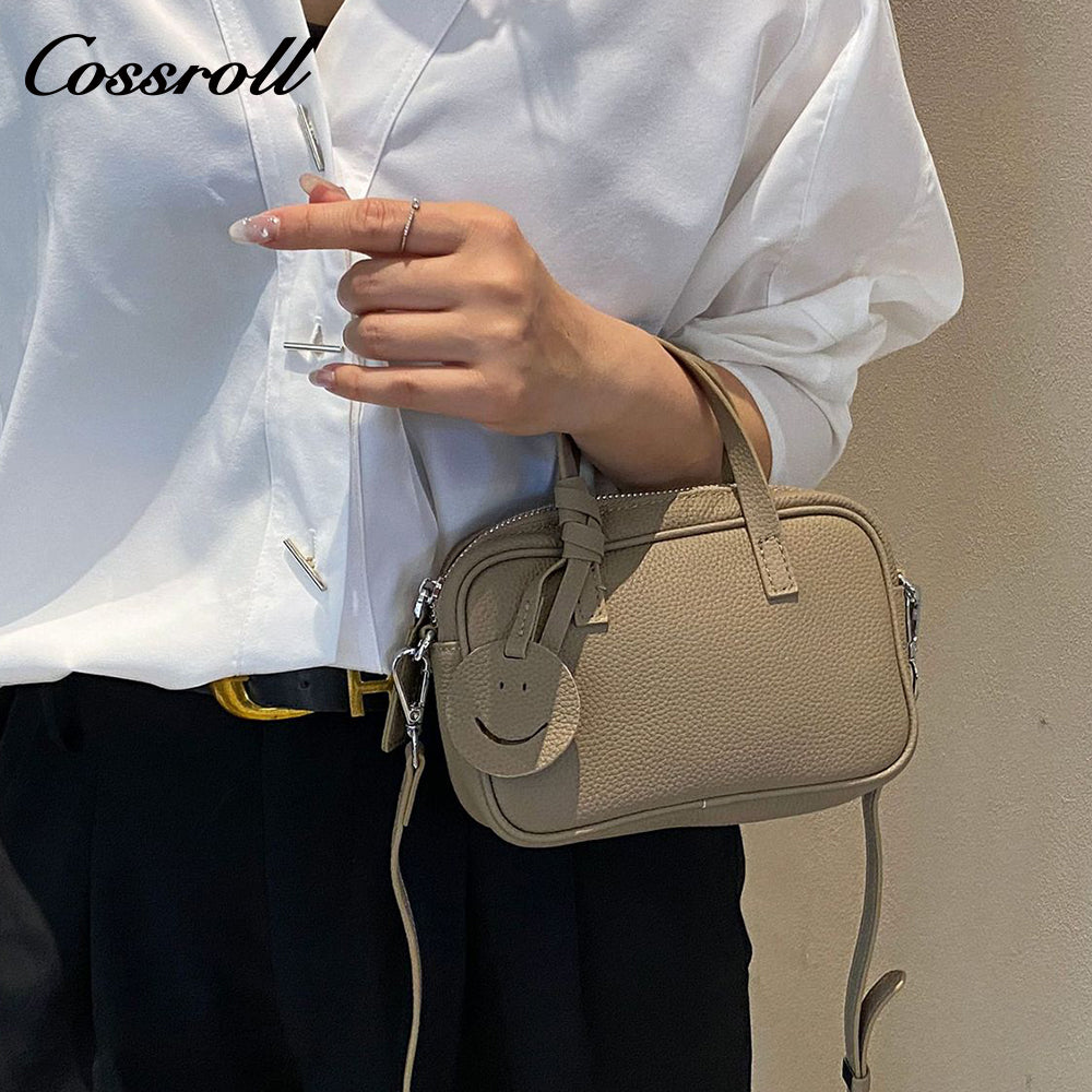 Head layer cowhide shoulder women's bag crossbody women's bag Europe and the United States fashion hundred practical soft leather round barrel apple bag leather