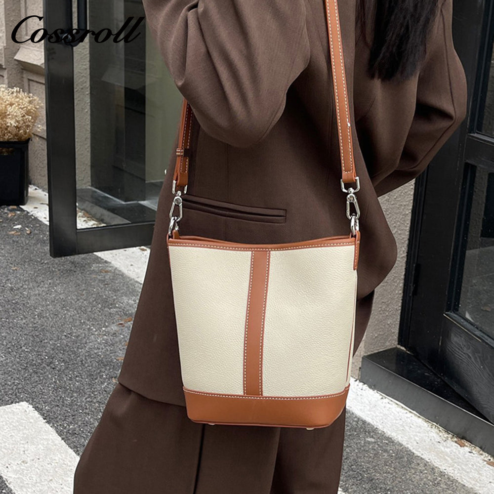 Simple fashion color collision commuter 2025 new togo head layer cowhide bucket bag shoulder bag
