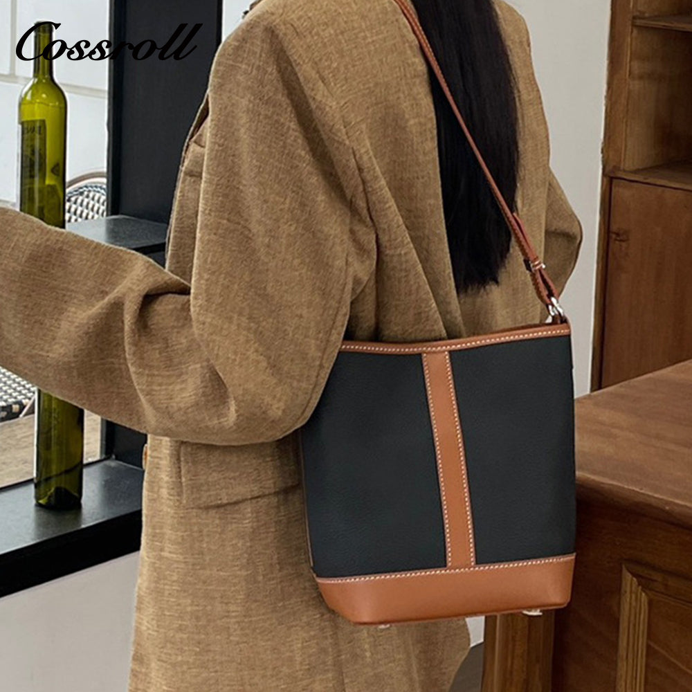 Simple fashion color collision commuter 2025 new togo head layer cowhide bucket bag shoulder bag