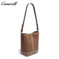 Simple fashion color collision commuter 2025 new togo head layer cowhide bucket bag shoulder bag