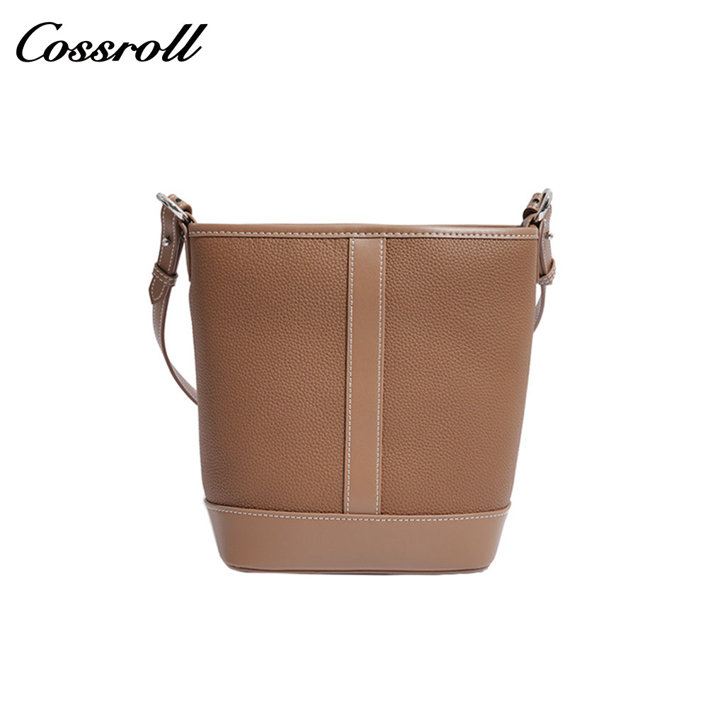 Simple fashion color collision commuter 2025 new togo head layer cowhide bucket bag shoulder bag