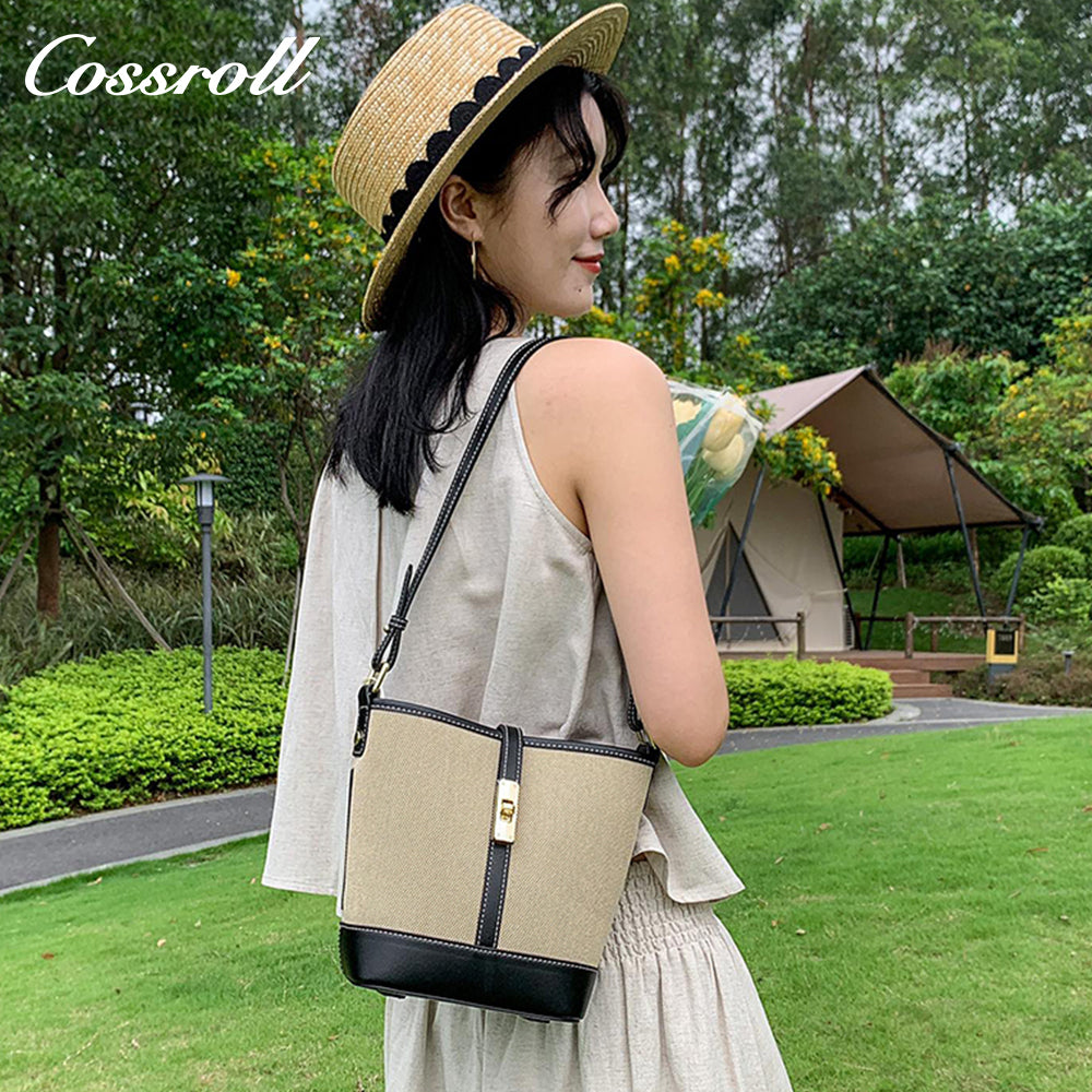 Cowhide canvas splicing bucket bag female 2024 summer single shoulder oblique cross bag leisure all-in-one underarm bag Korean version of the tide