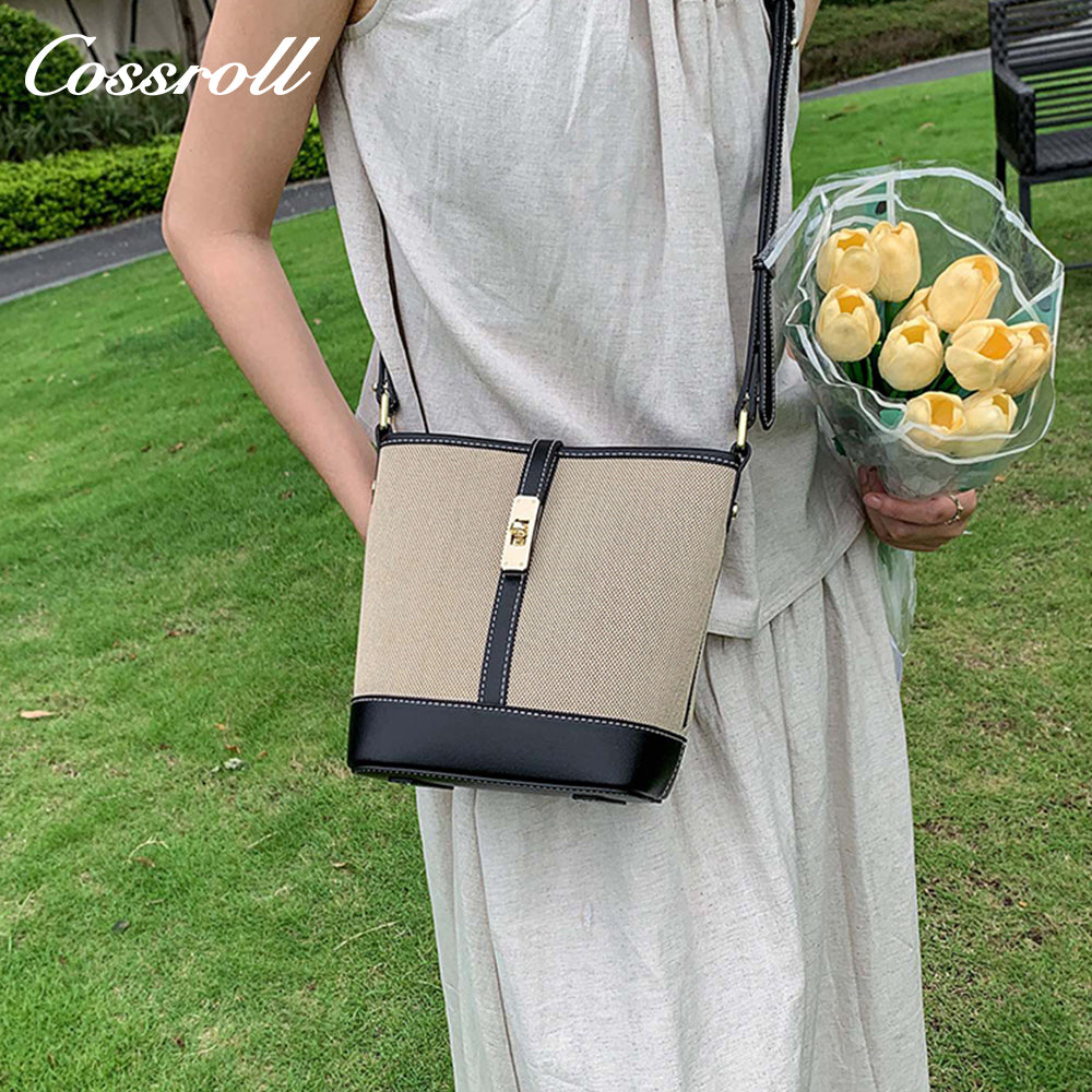 Cowhide canvas splicing bucket bag female 2024 summer single shoulder oblique cross bag leisure all-in-one underarm bag Korean version of the tide