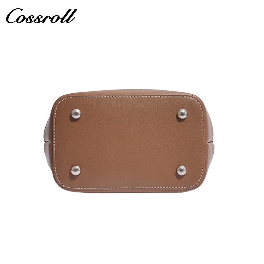 Simple fashion color collision commuter 2025 new togo head layer cowhide bucket bag shoulder bag