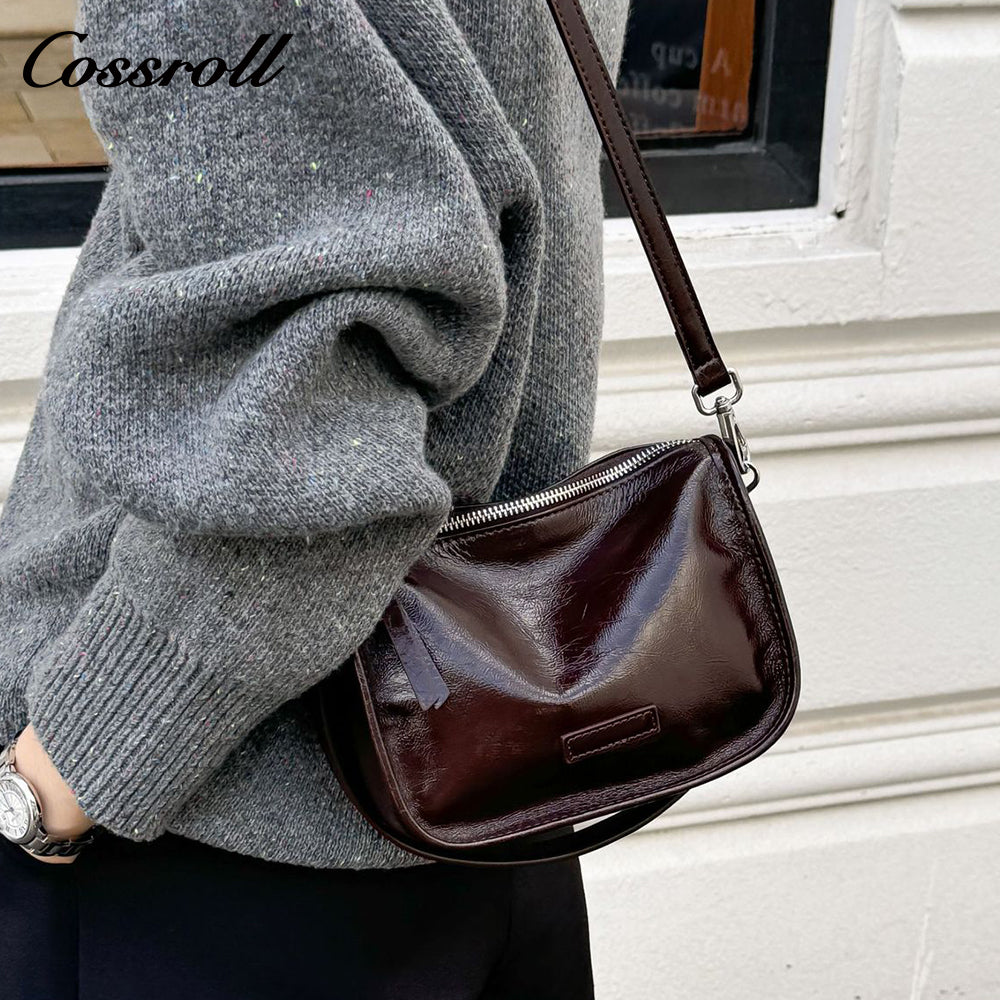 Oil wax cowhide bag female new fashion hundred with shoulder bag senior sense of niche retro commuting crossbody bag