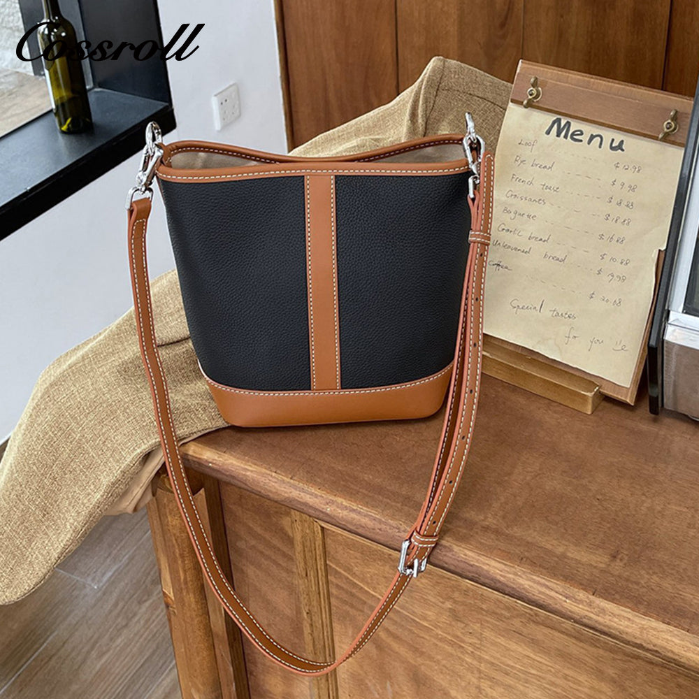 Simple fashion color collision commuter 2025 new togo head layer cowhide bucket bag shoulder bag