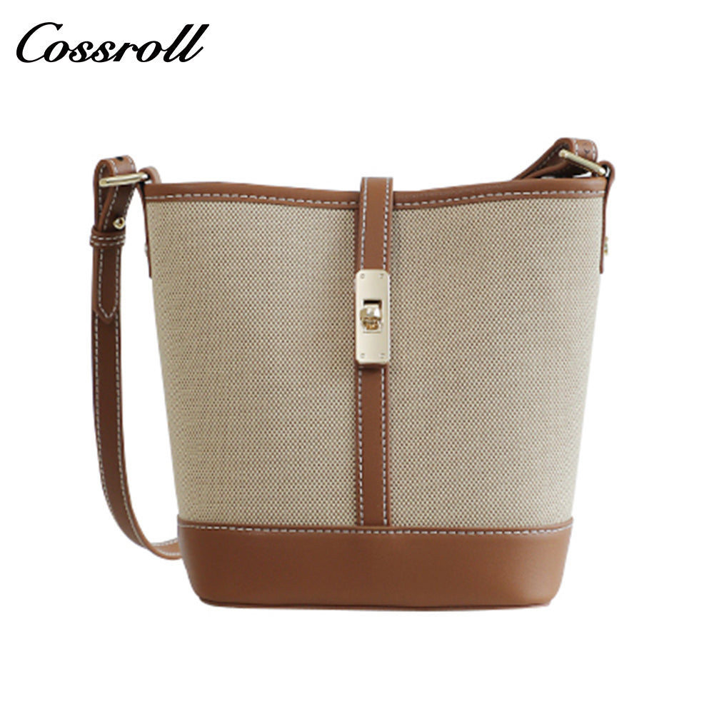 Cowhide canvas splicing bucket bag female 2024 summer single shoulder oblique cross bag leisure all-in-one underarm bag Korean version of the tide