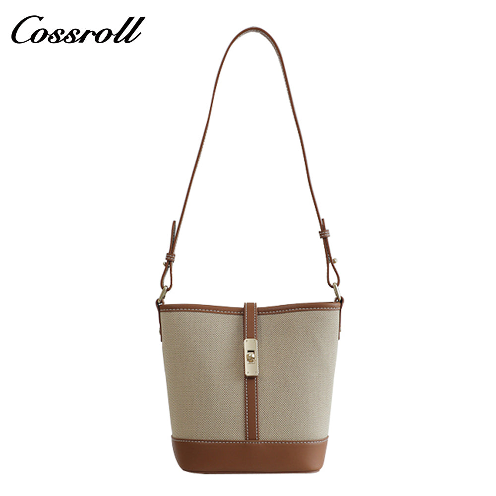 Cowhide canvas splicing bucket bag female 2024 summer single shoulder oblique cross bag leisure all-in-one underarm bag Korean version of the tide