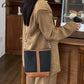 Simple fashion color collision commuter 2025 new togo head layer cowhide bucket bag shoulder bag