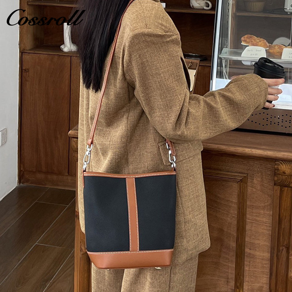Simple fashion color collision commuter 2025 new togo head layer cowhide bucket bag shoulder bag