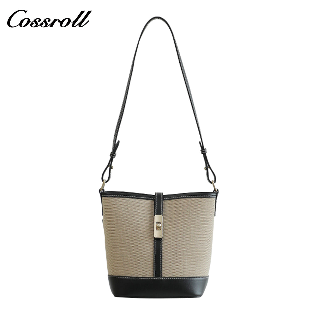 Cowhide canvas splicing bucket bag female 2024 summer single shoulder oblique cross bag leisure all-in-one underarm bag Korean version of the tide