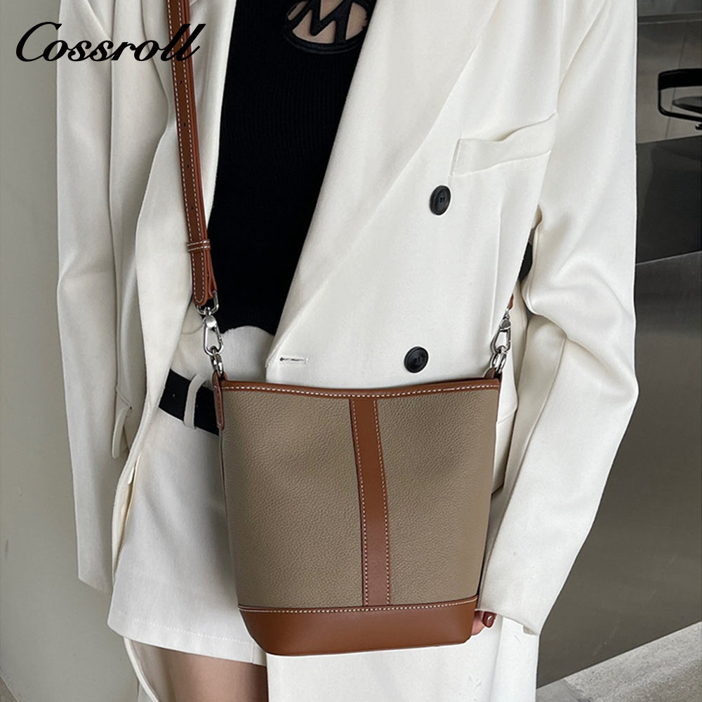 Simple fashion color collision commuter 2025 new togo head layer cowhide bucket bag shoulder bag
