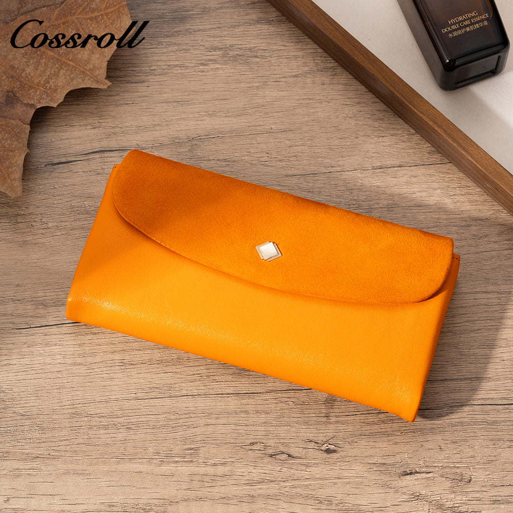 Women's long wallet with multiple card slots, zipper, double-layer bill compartment, and coin purse in suede finish